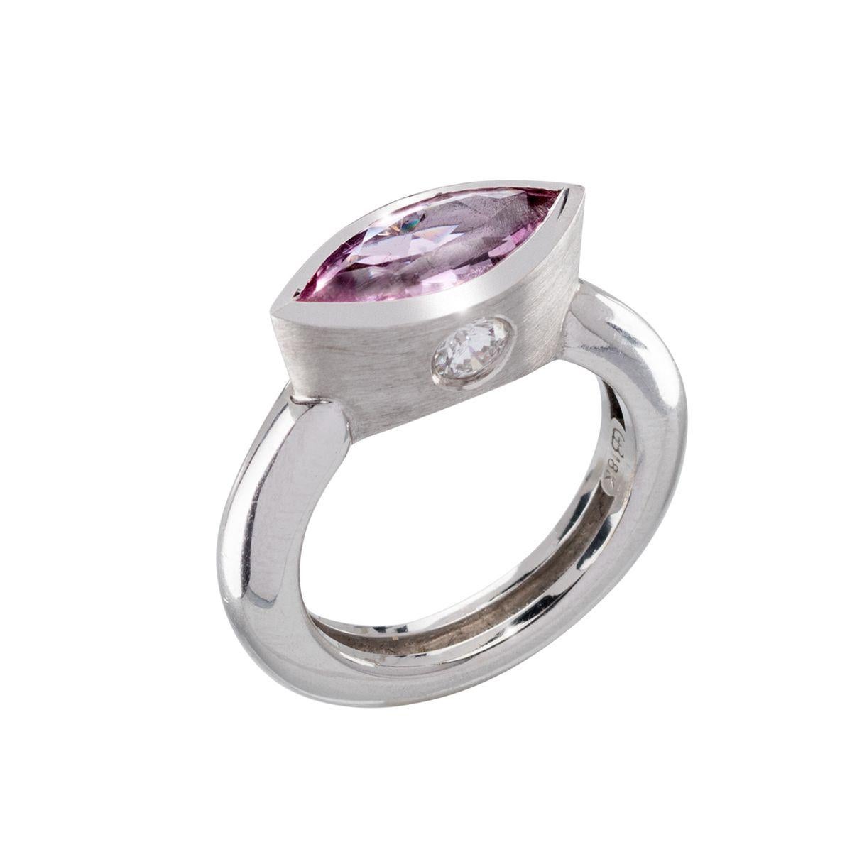 Bezel set in 18k white gold with diamond inlays, the pretty pink marquise sapphire is an everyday classic ring that remains timeless and can be worn for any occasion.

Weight: 
Pink Natural Sapphire - 1.62 carats
Diamonds - 0.30 carats