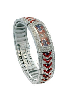 Montre Mauboussin en or blanc 18 carats Cadran diamants, corail et améthyste