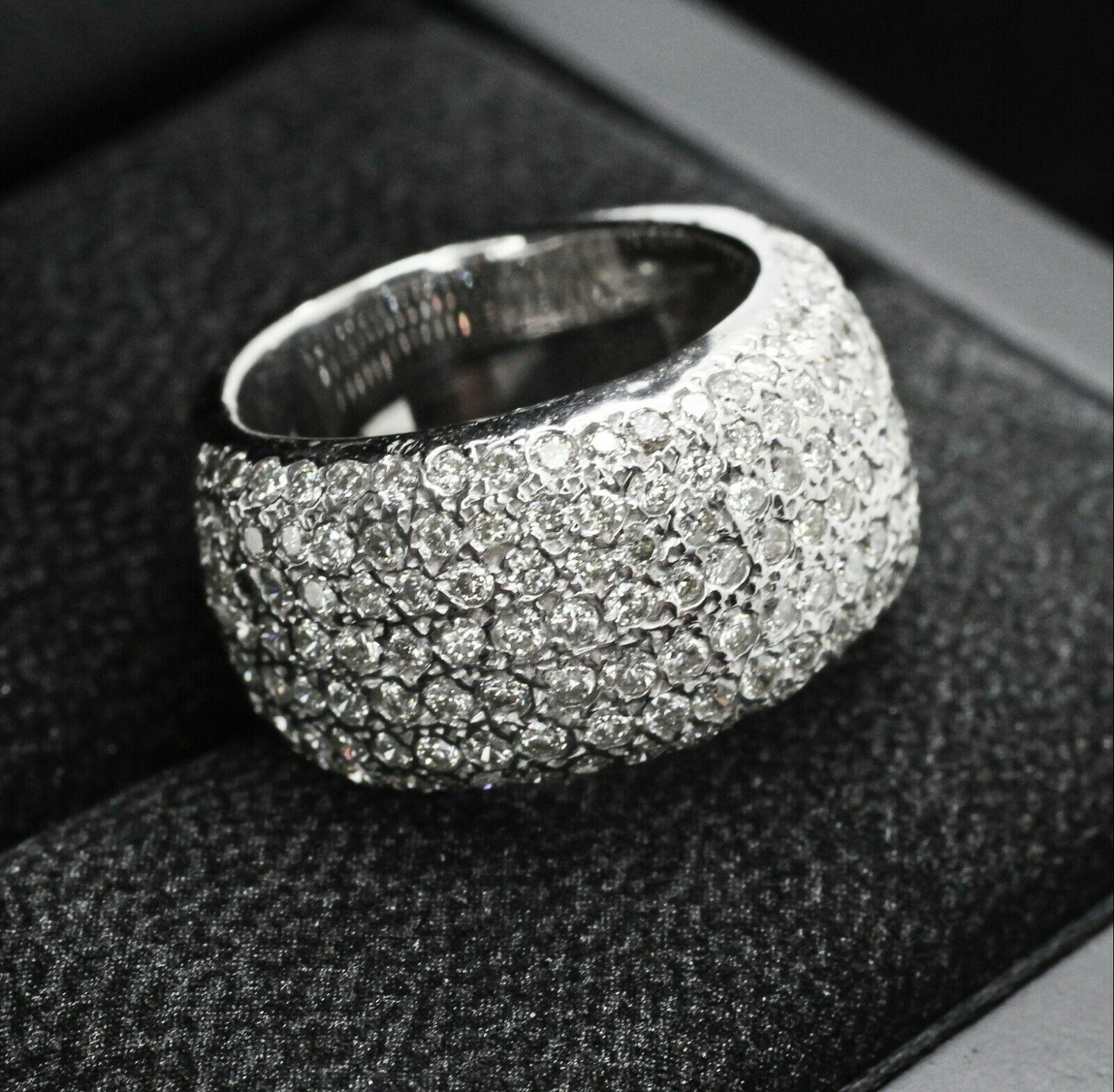  Product Details
    Metal: 18K WHITE GOLD
    Measurements :
        Width: 10.42
        Thickness: 2.38mm
Specifications:
    main stone: ROUND CUT DIAMONDS
    diamonds: 166 PCS
    carat total weight: APPROXIMATELY 1.50CTW
    color: G
   