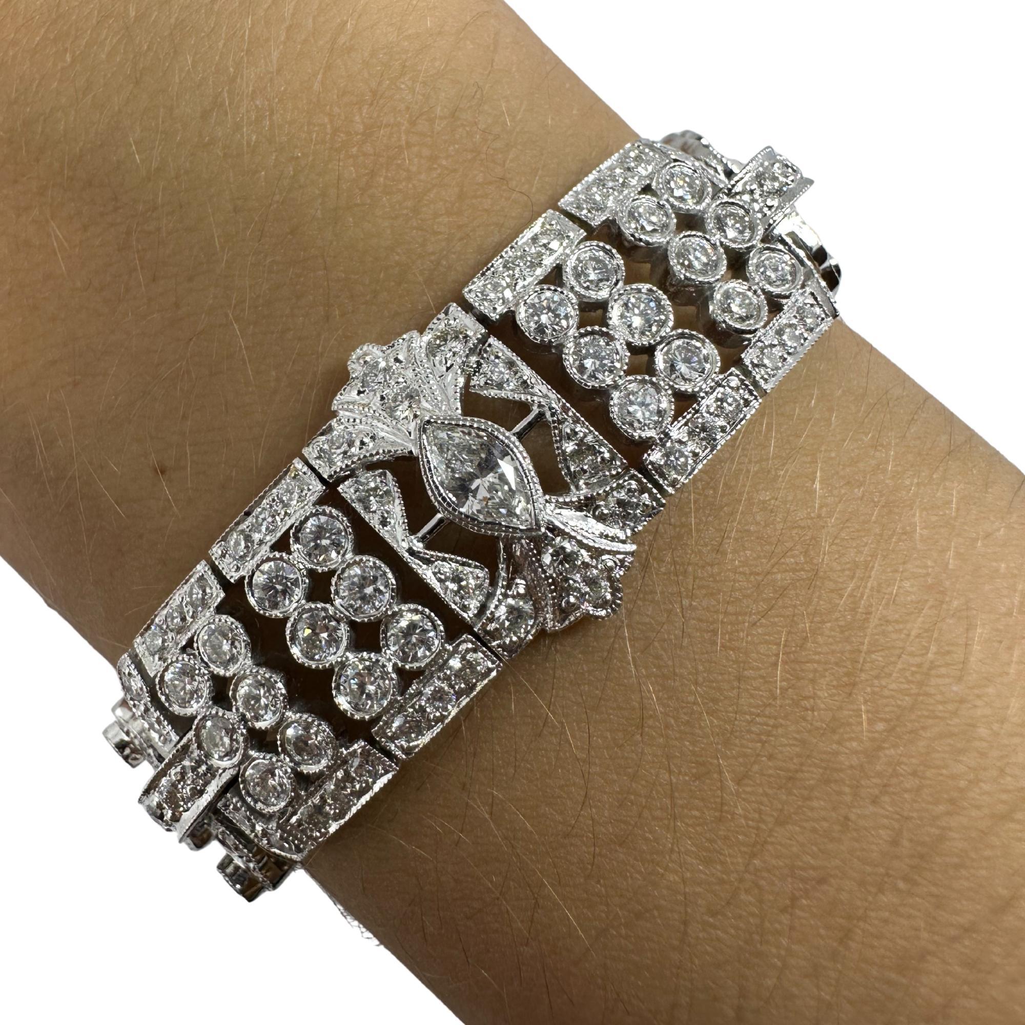 Showcasing this vintage-inspired 18K White Gold 12.10 Carat Diamond Bracelet, featuring marquise and emerald-cut diamond accents across the bracelet.


18K White Gold 12.10 Carat Diamond Bracelet - 8 inches
Condition: In good condition with some