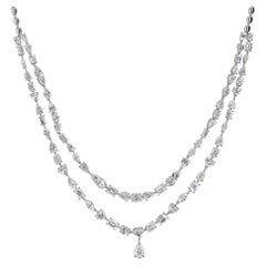 Collana vistosa in oro bianco 18 carati con diamanti di forme diverse, 21,43 carati