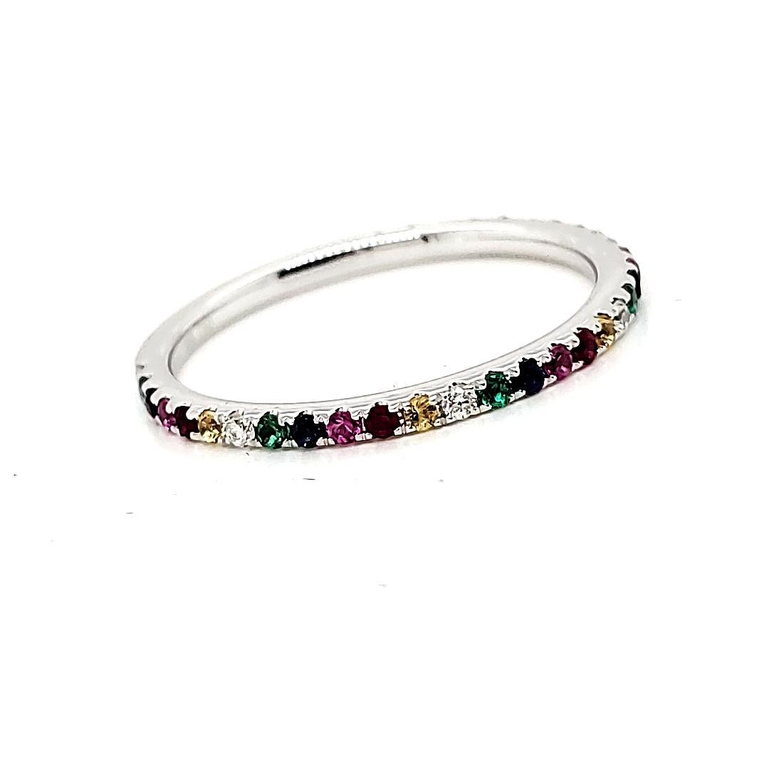 Sparkle with elegance and charm wearing our exquisite multi-color stone ring. 

Encrusted with 6 round diamonds totaling 0.09 carats and embellished with a stunning array of 27 multi-color stones totaling 0.34 carats.

This engagement ring is