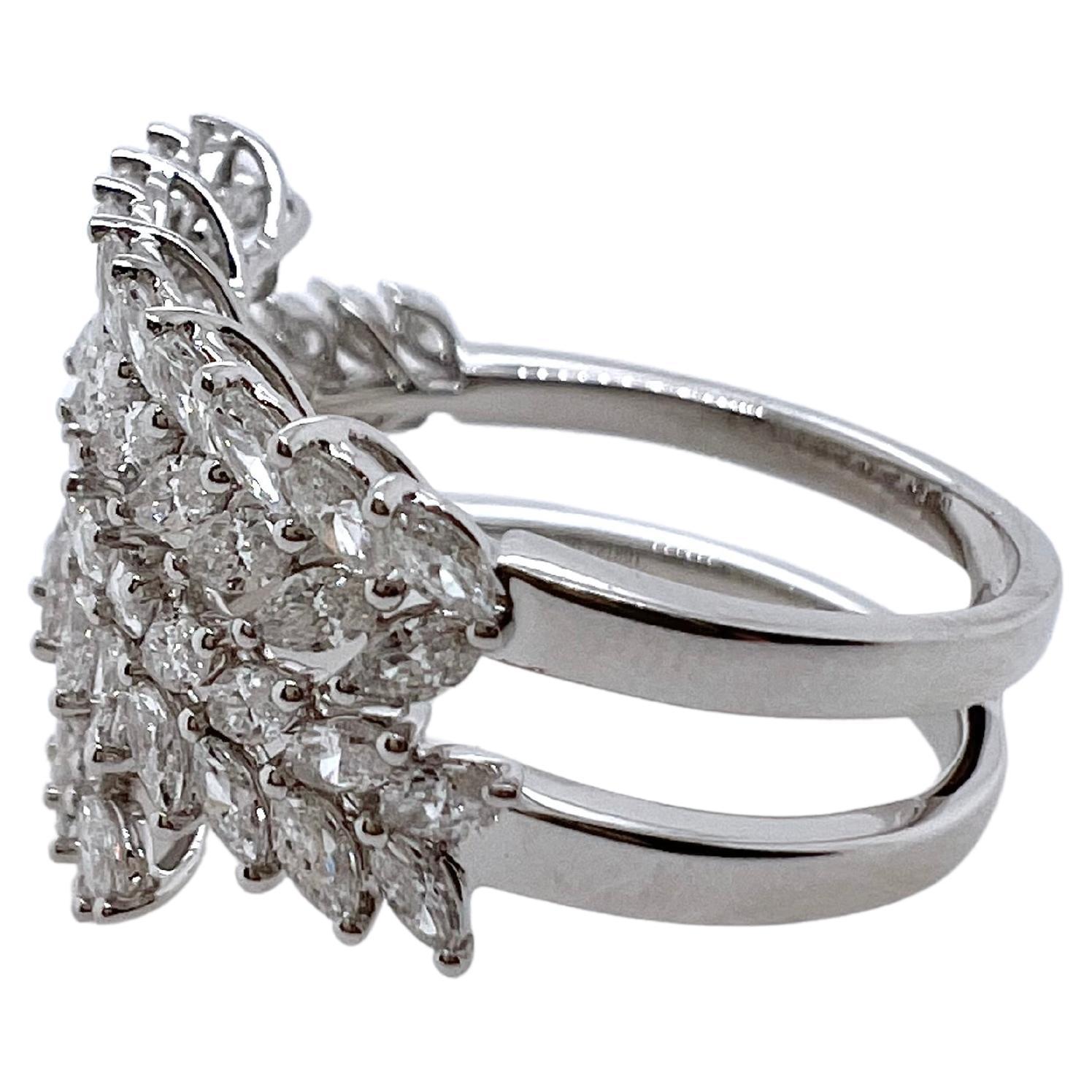 A fabulous ring that will get everyone's attention! The marquise diamonds are set and arranged to mimic a wreath
pattern that is absolutely stunning.  The 3 rows of diamonds are arranged to give your finger the perfect look!



Size: 7 (can be