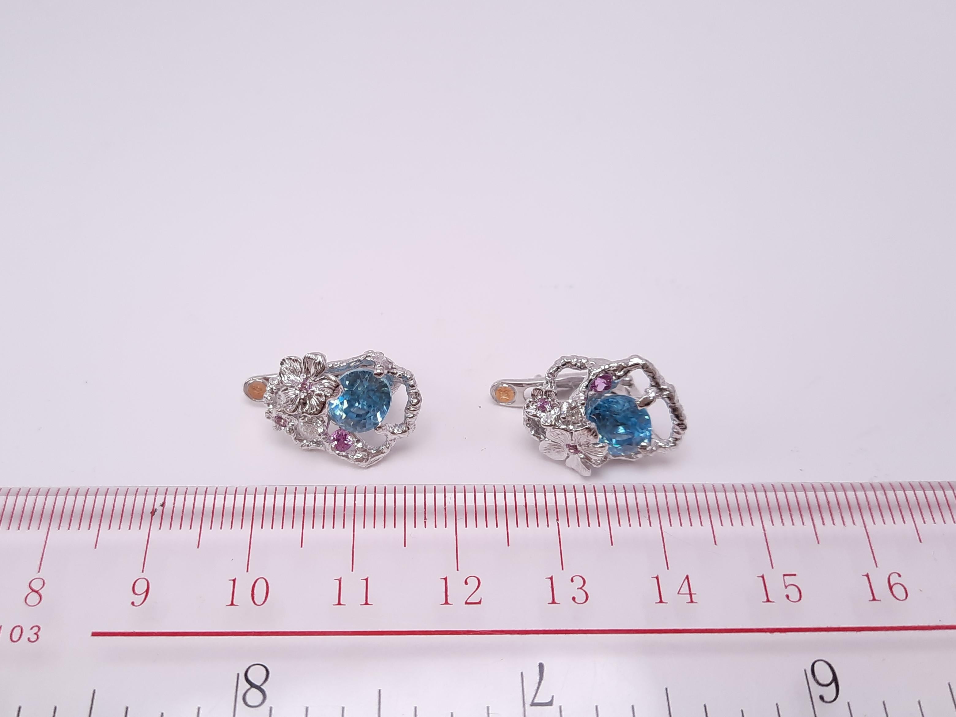 This handmade earrings made with sky blue natural Zircons, dazzling diamonds, and fashionable rose colour sapphires from MOISEIKIN🄬 remind you of the pagoda blue sky and the tale of Snow Queen. Or one may think of the ocean. The blue Zircons with
