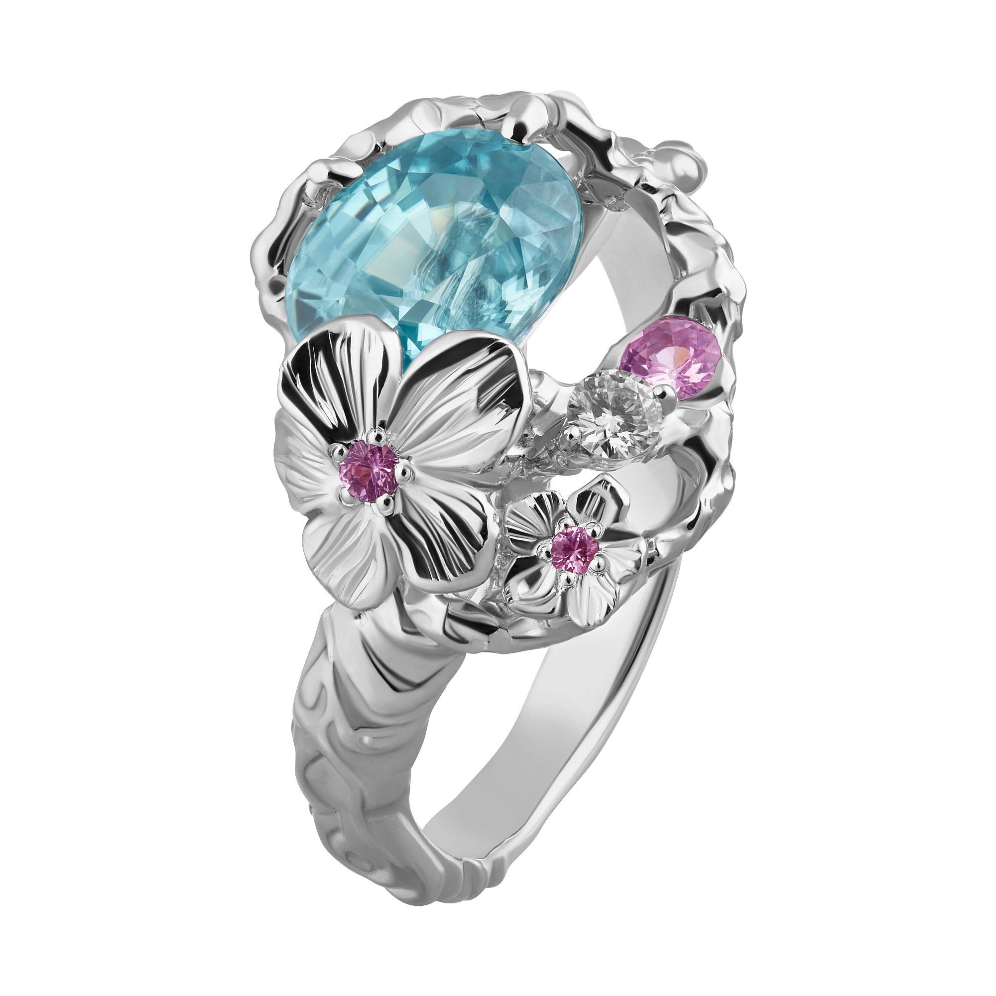 This handmade ring with a sky blue natural Zircon, dazzling diamonds, and fashionable rose colour sapphires from MOISEIKIN🄬 reminds you of the pagoda blue sky and the tale of Snow Queen. Or one may think of the ocean. The blue Zircon with flawless