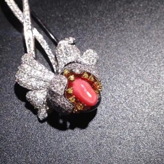 18 Karat White Gold Natural Conch Pearl and Yellow Diamond Flower Brooch