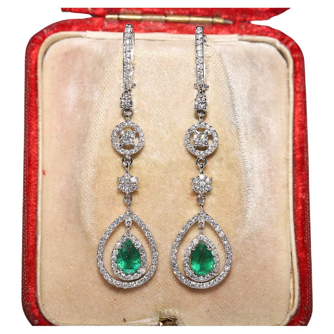18k White Gold Natural Diamond And Emerald Decorated Drop Earring