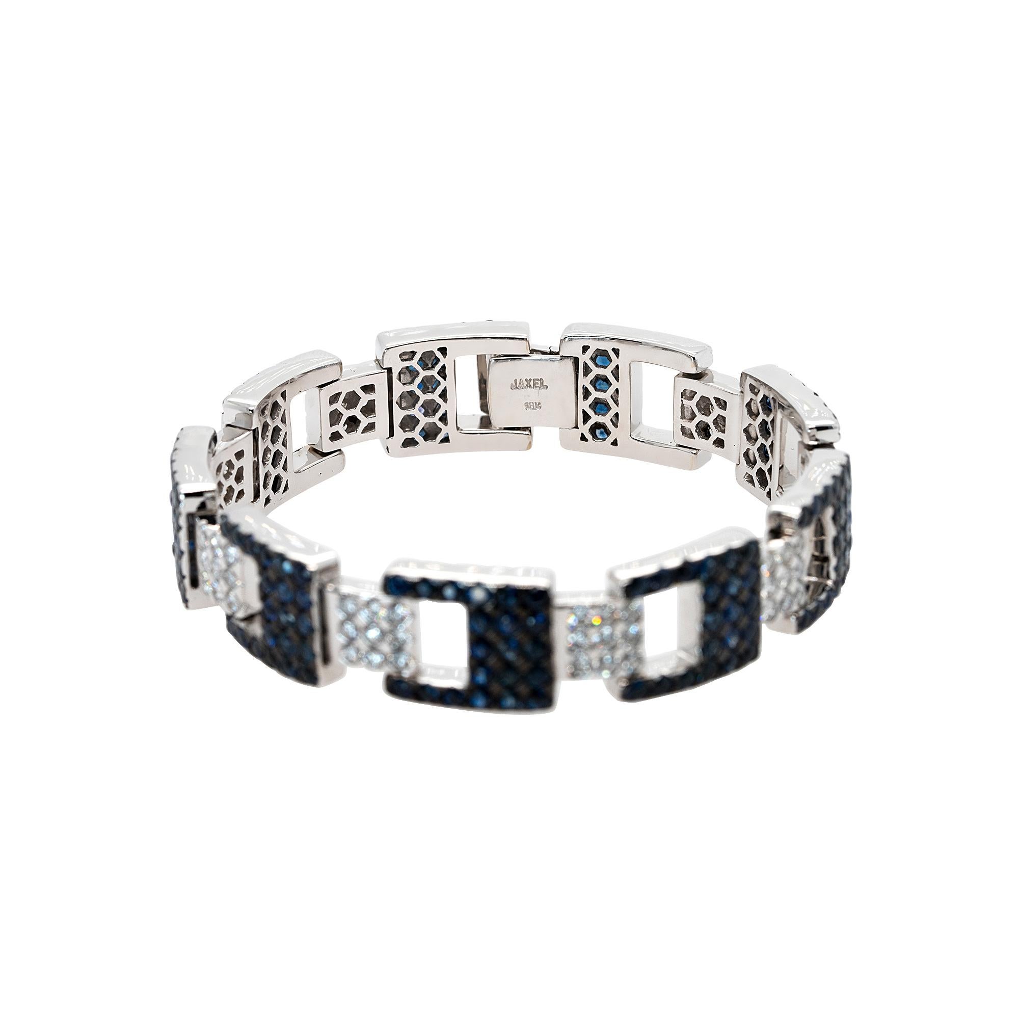 Material: 18k White Gold
Diamond Details: 2.43ctw of Round Brilliant Diamonds G color and VS clarity.
Gem Details: 8.10ctw of Round Blue Sapphires Measurements: 7'' 12.6mm x 3.7mmTotal Weight: 48.9G (31.3 dwt)
This item comes with a presentation
