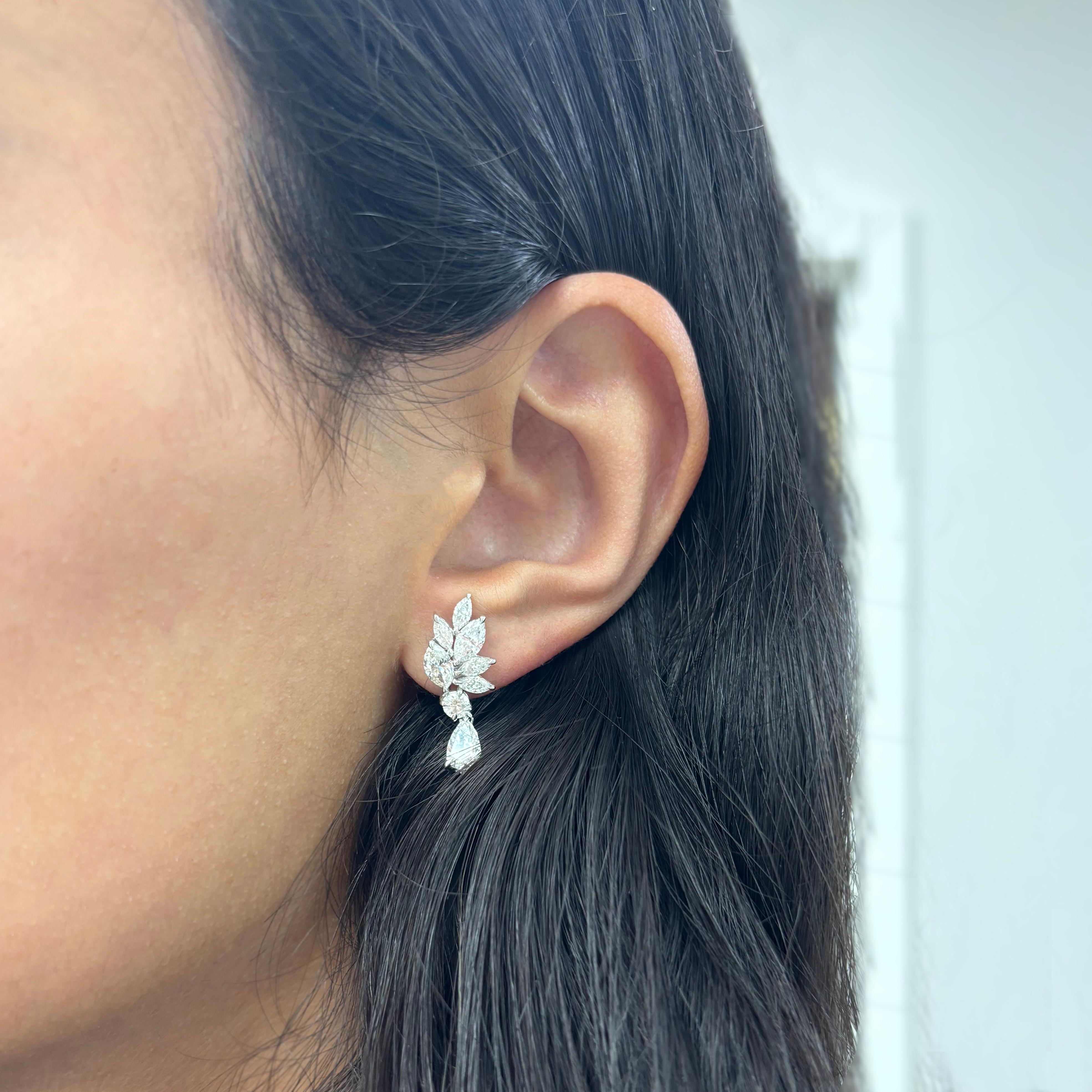 These are 18K White Gold beautiful quality set diamond drop earrings featuring all Natural Diamonds with a color and clarity of GH-SI1.

- 18K White Gold
- Gold Weight 5.17 grams
- Total Carat Weight 3.62ct (2 round diamonds 0.36cts, 12 Marquise