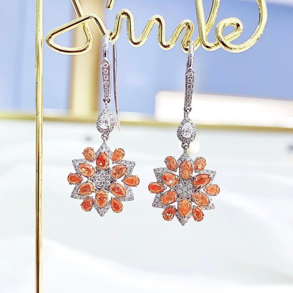 18K White Gold Natural Fancy Orange Diamond Sunflower Earrings with Diamonds

24 Orange Diamonds - 2.30 CT
Diamonds - 0.56 CT
18K White Gold - 5.07 GM

Special rare orange color diamonds - as radiant as the sun, a unique collector's item.

A