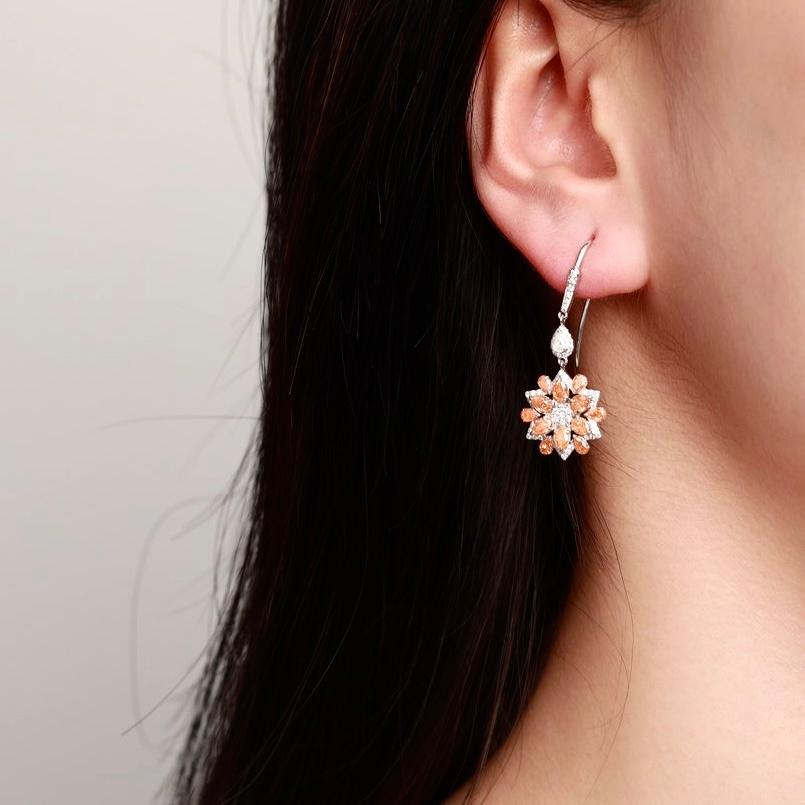 Modern 18K White Gold Natural Fancy Orange Diamond Sunflower Earrings with Diamonds For Sale
