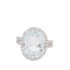 Anello con diamante naturale e acquamarina in oro bianco