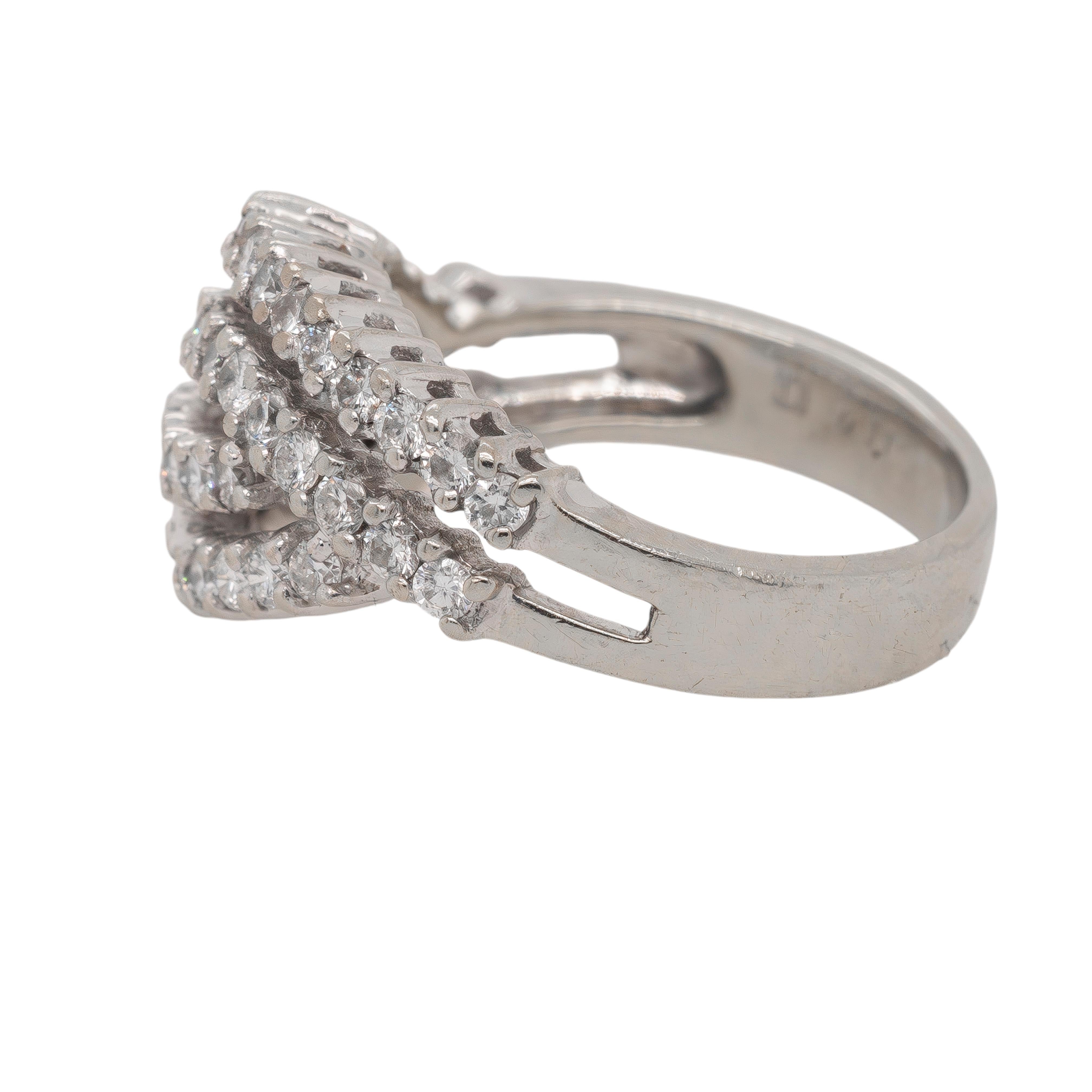 Refined and elegant, this 18k white gold diamond ring is a classic choice for those who appreciate timeless design. The ring is set with approximately 0.8 carats of natural round brilliant diamonds, each offering exceptional sparkle and brilliance. 