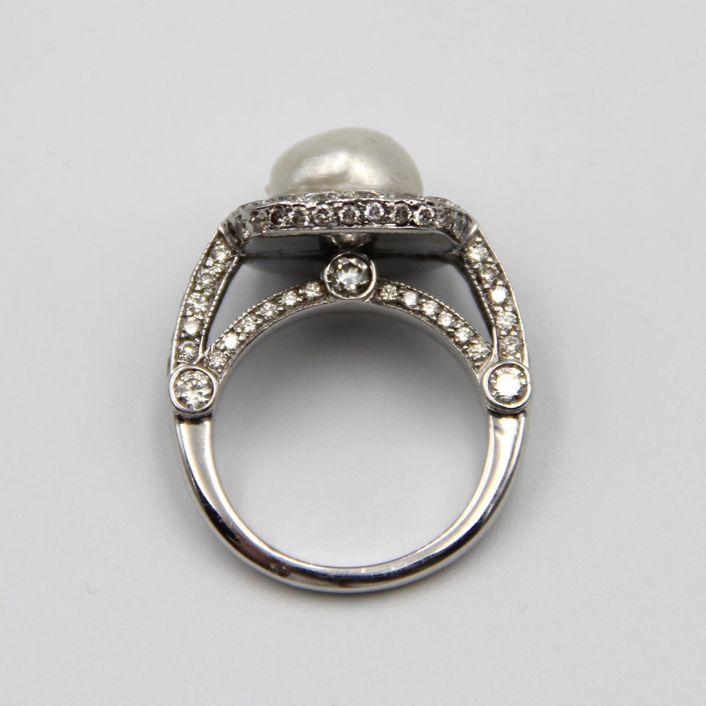 This amazing pearl ring rounded with approx. total 2carat Old European Cut Diamonds . Circa 1920