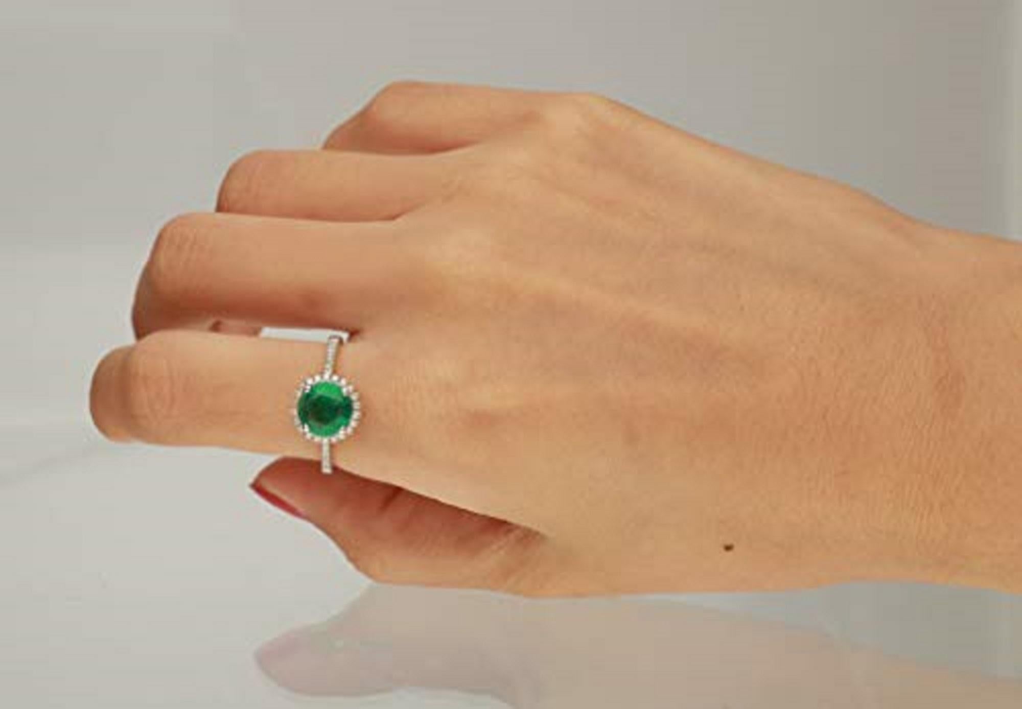 Stunning, timeless and classy eternity Unique Ring. Decorate yourself in luxury with this Gin & Grace Ring. The 18k White Gold jewelry boasts Round-Cut Prong Setting Natural Emerald (1 pcs) 1.57 Carat, along with Natural Round cut white Diamond (36