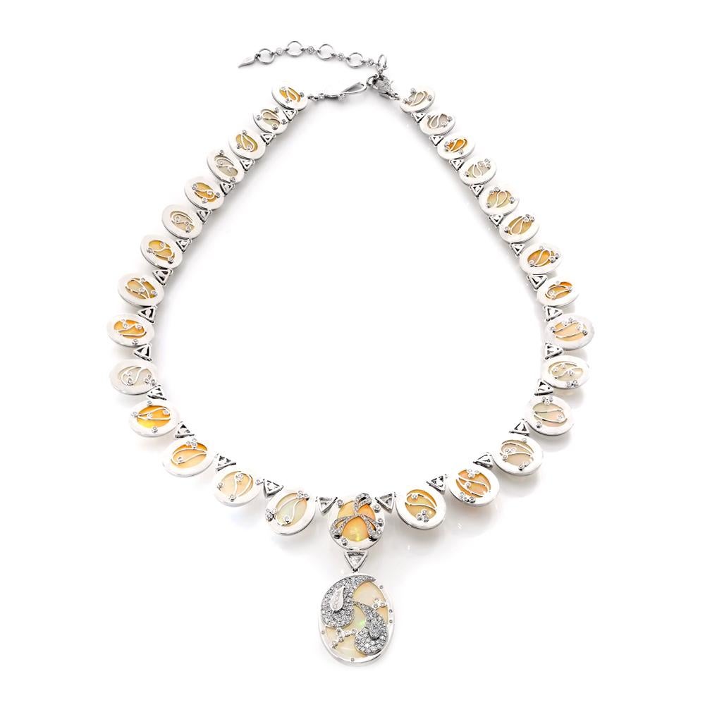 Flawless 18 Karat White Gold Necklace Set with 133.13-carat Ethiopian Opals and 7.26-carat Rose-Cut Diamonds. This is part of COOMI's Trinity Collection and made with inspiration from the Ganges River that is believed to have been sent down from