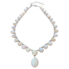 Collana in oro bianco 18K con opali etiopi e diamanti da 133,13 carati