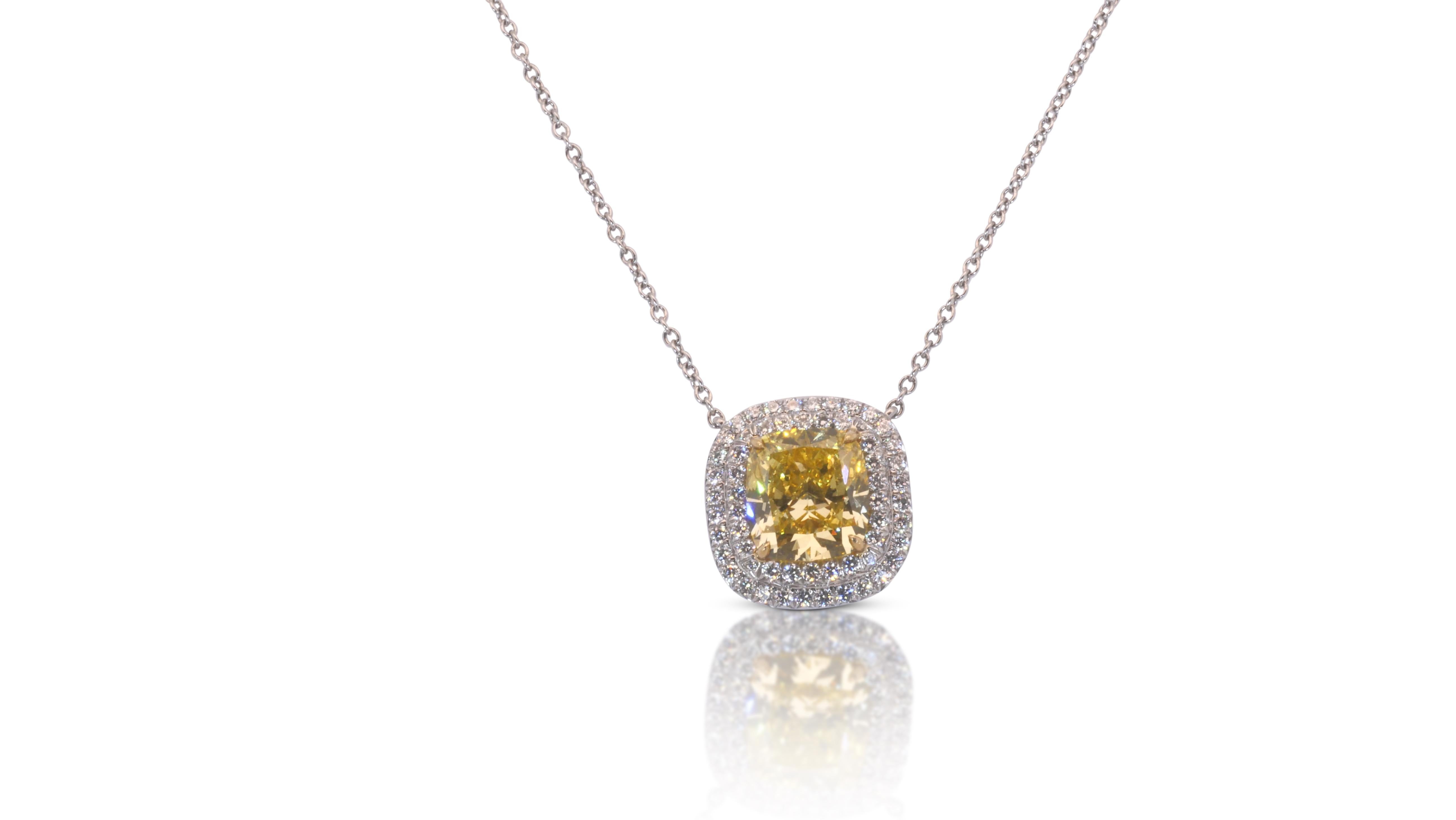 A beautiful necklace with pendant with a dazzling 2.56 carat cushion natural diamond. It has 0.7 carat of side diamonds which add more to its elegance. The jewelry is made of18k White Gold Chain and a Platinum Pendant with a high quality polish. It