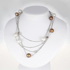 18K White Gold Necklace with White and Brown Pearls, Diamond Flowers, and Brilli