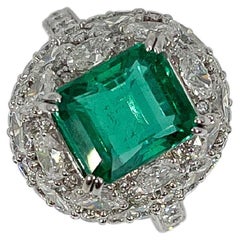 18K White Gold Octagon Step Cut 4.48 CT Emerald and Diamond Ring