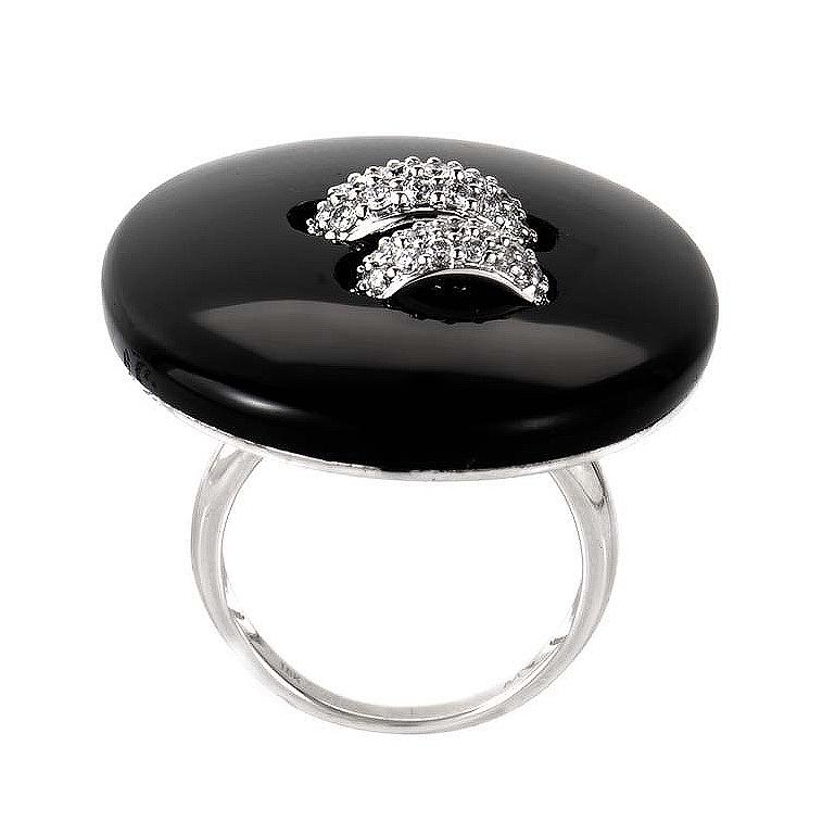 This ring is cute as a button, and shaped like one too! It is made of 18K white gold and boasts a button-shaped motif made of onyx and accented with ~.72ct of diamonds.
Ring Size: 6.5
