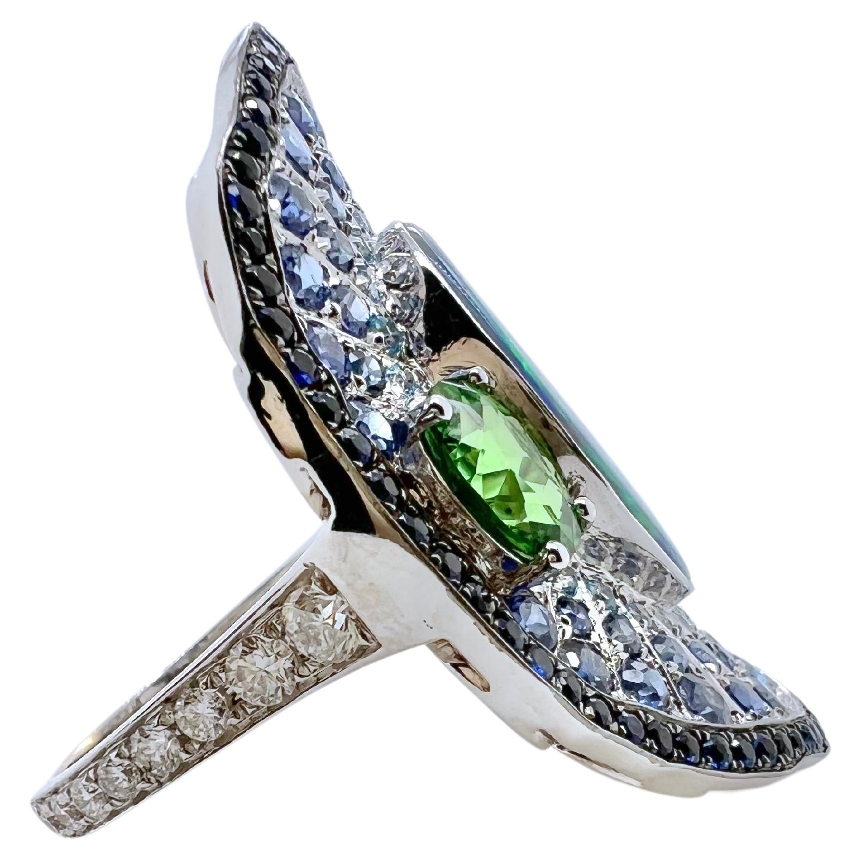 Oval Cut 18k White Gold Opal Ring with Tsavorite, Colored Sapphires, and Diamonds For Sale