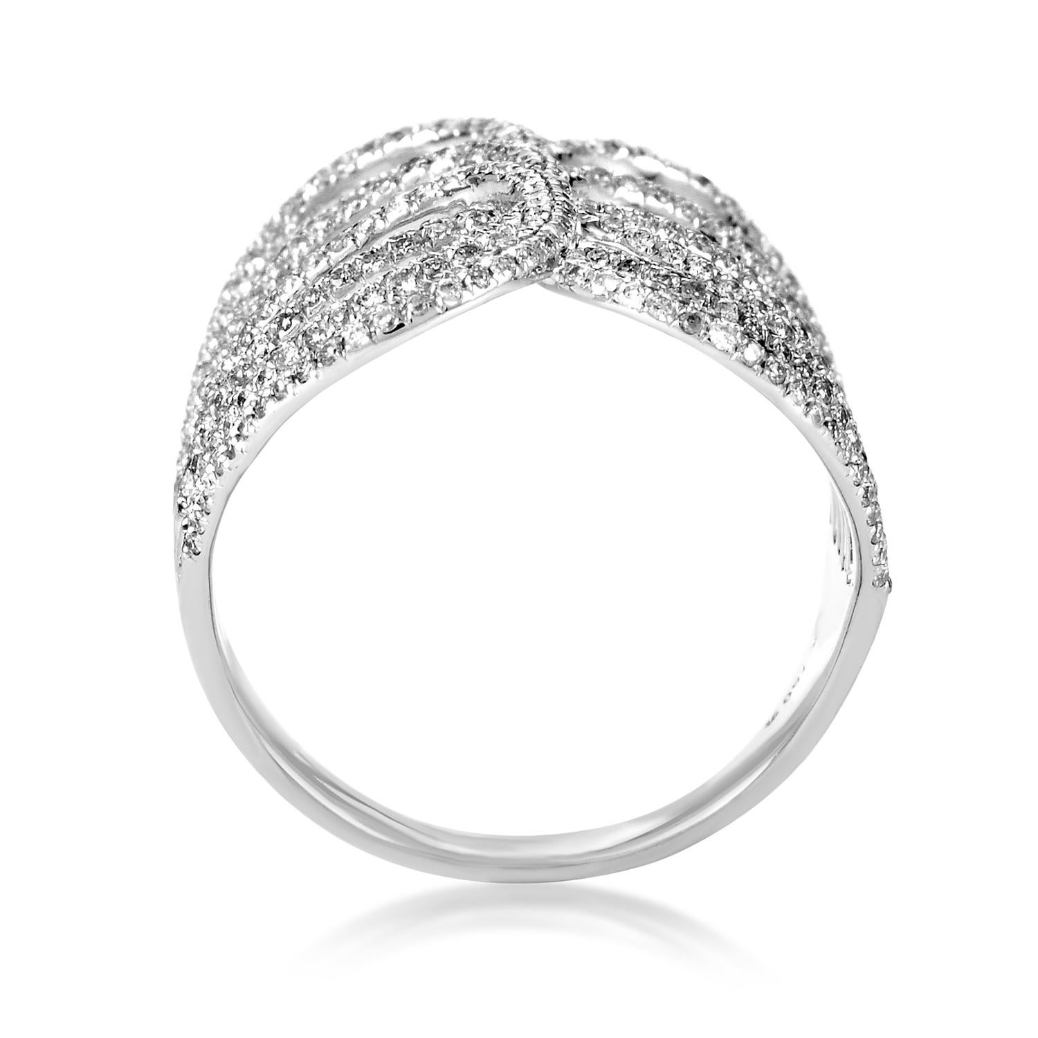 Laid out upon your finger in a pleasantly graceful manner, the fascinating shape of this enchanting 18K white gold ring is emphasized by the luxurious glisten of diamonds weighing in total 0.87ct.<Br/>Ring Top Dimensions: 25 x 20mm
