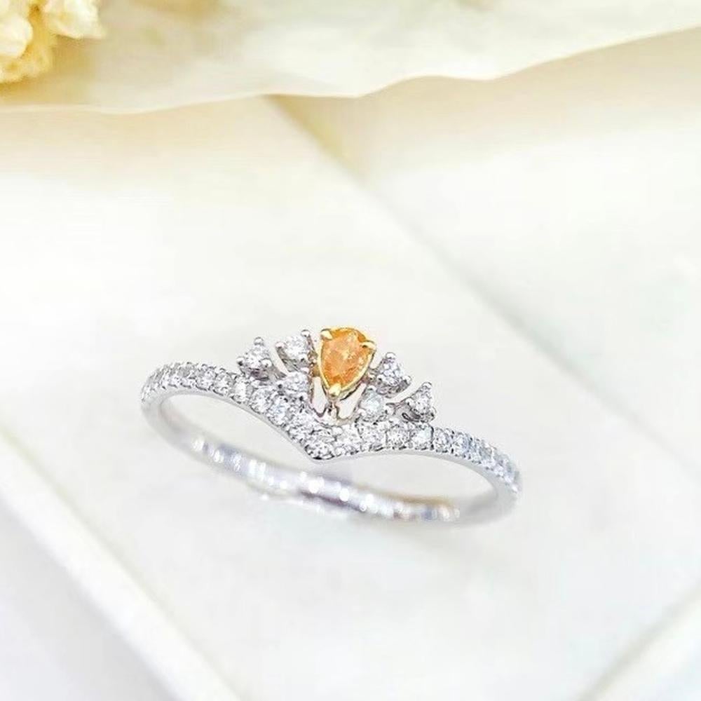 18K White Gold Orange Diamond Crown-Shaped Engagement Ring 

1` Orange Diamond - 0.07 CT
Diamonds - 0.20 CT
Total Weight - 1.59 GM
Customizable