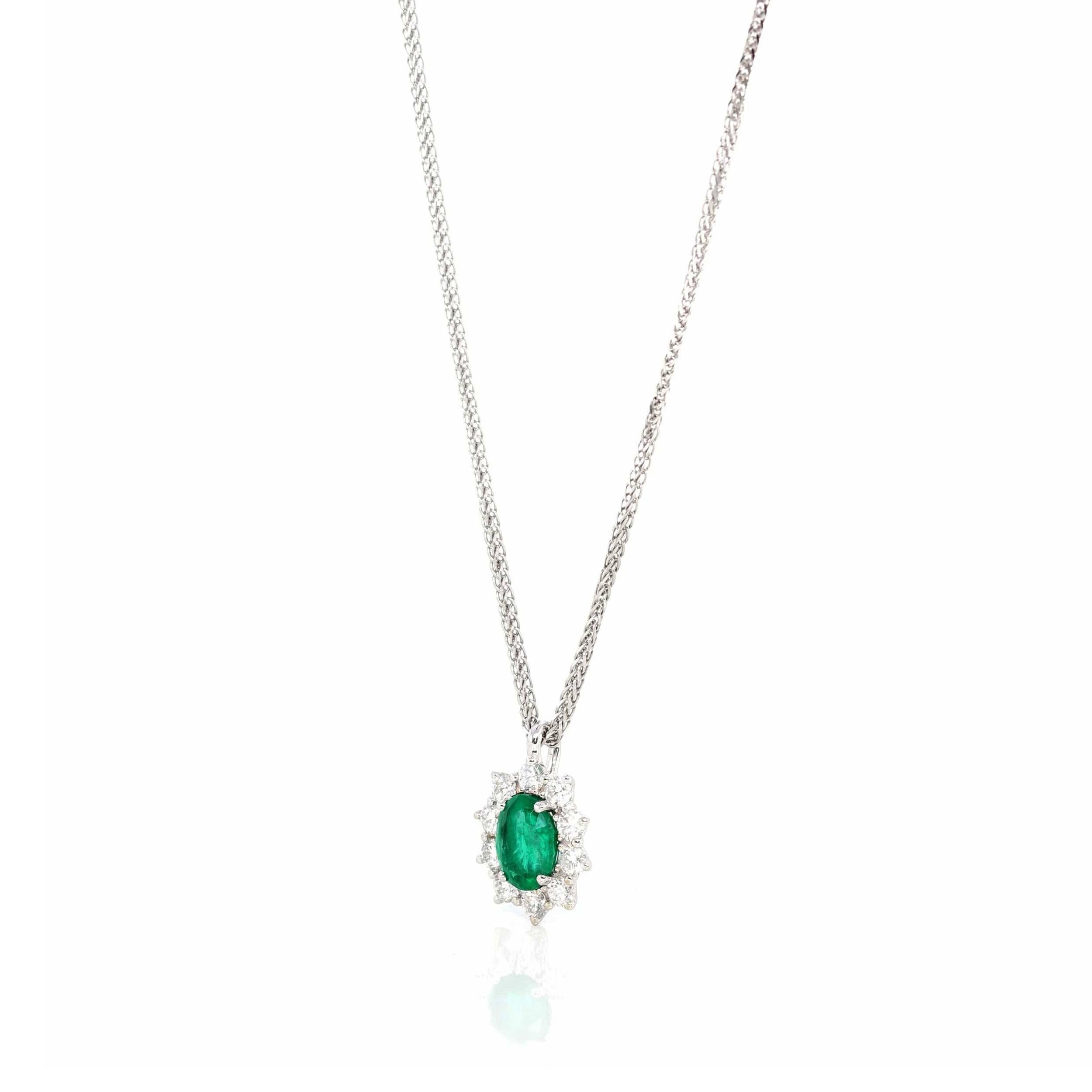 * Design Concept--- Part of Baikalla™'s genuine gemstone jewelry collection. This beautiful natural AAA emerald's beauty is brought out by this gorgeous 4-prong mounting. Surrounded by VS1 sparkling diamonds. This is truly a piece for gemstone
