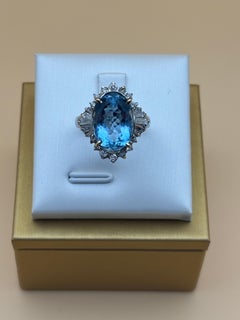 18k White Gold Oval Aquamarine and Diamond Halo Cocktail Ring