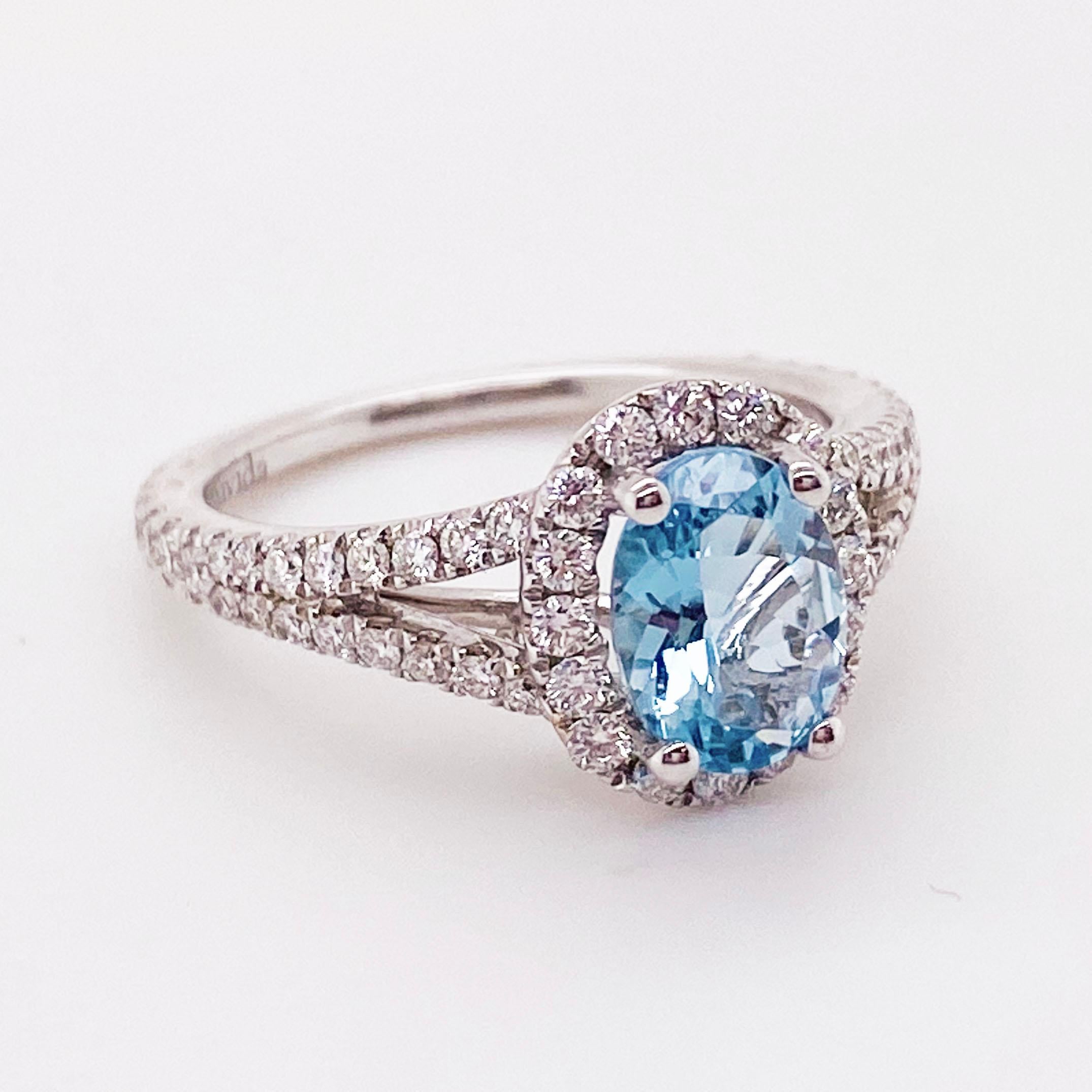 18 Karat White Gold
1.59 ct tw Diamonds and Aquamarine
Oval Aquamarine 
.95 carat Aquamarine 
.64 carats total diamond weight 
Ring Size- 6.75 (can be resized)
60 total diamonds 