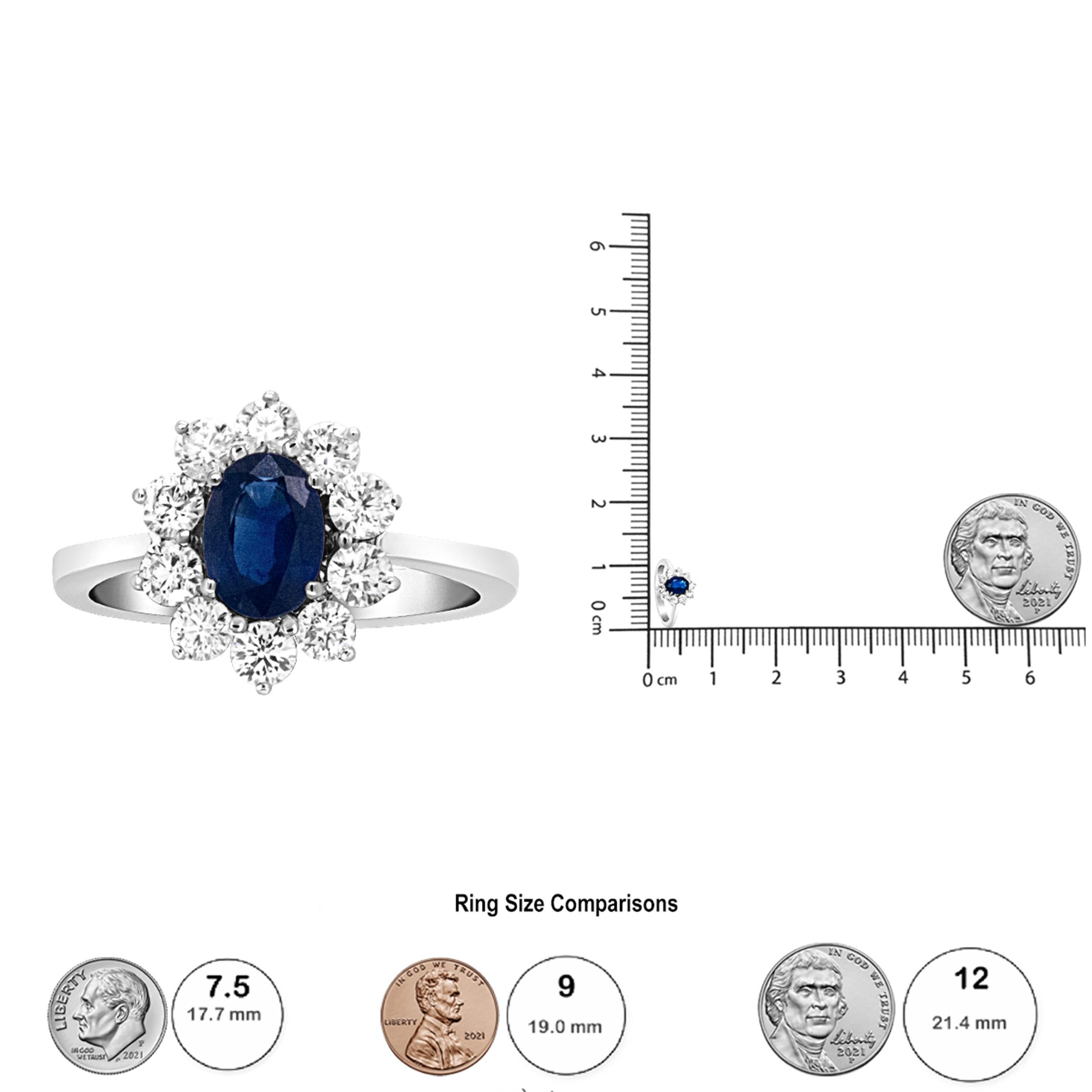 Contemporary 18K White Gold Oval Cut Blue Sapphire and Diamond 3/4 Carat Sunburst Halo Ring For Sale