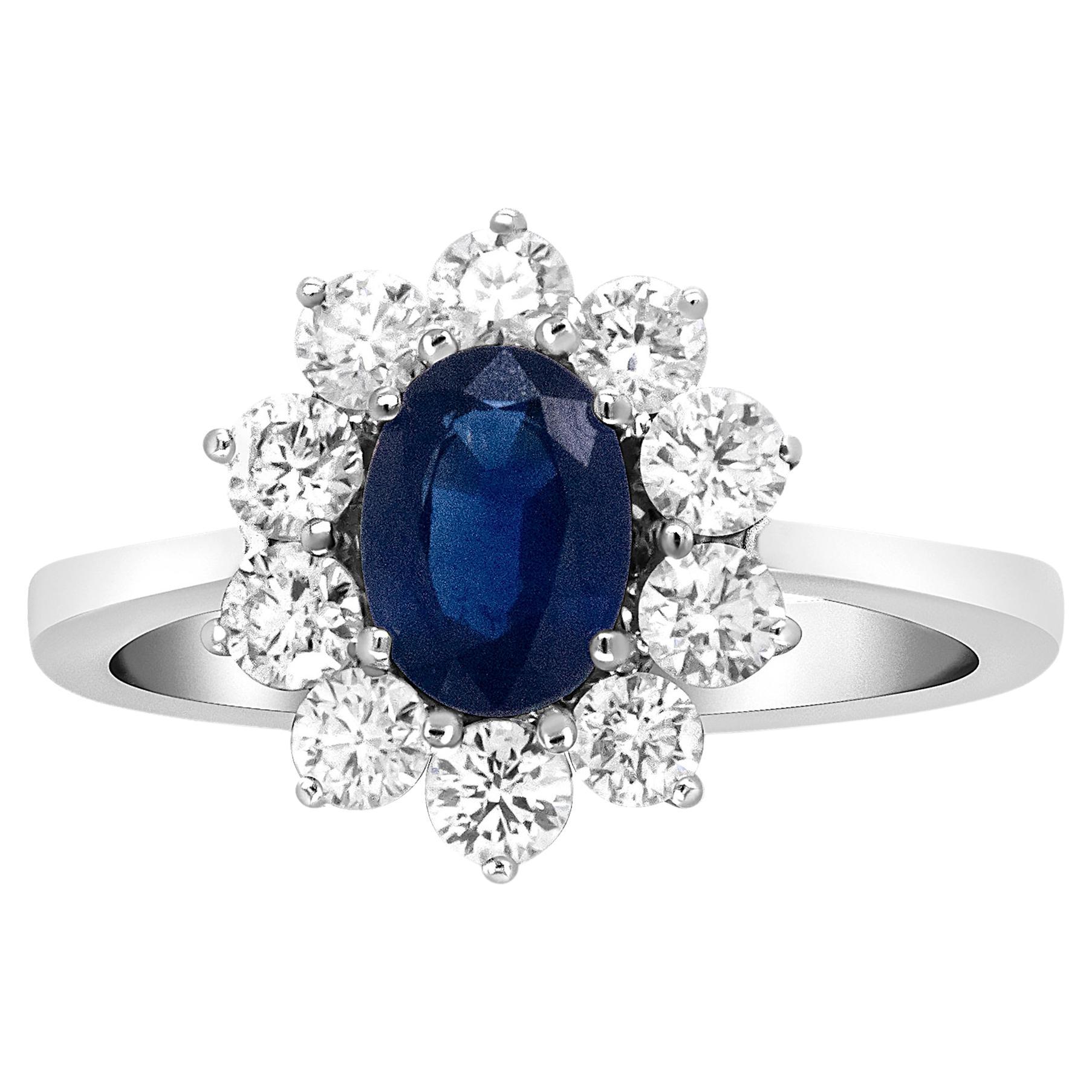 18K White Gold Oval Cut Blue Sapphire and Diamond 3/4 Carat Sunburst Halo Ring For Sale