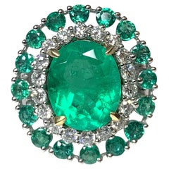 18K White Gold Oval Cut Emerald Diamond Ring