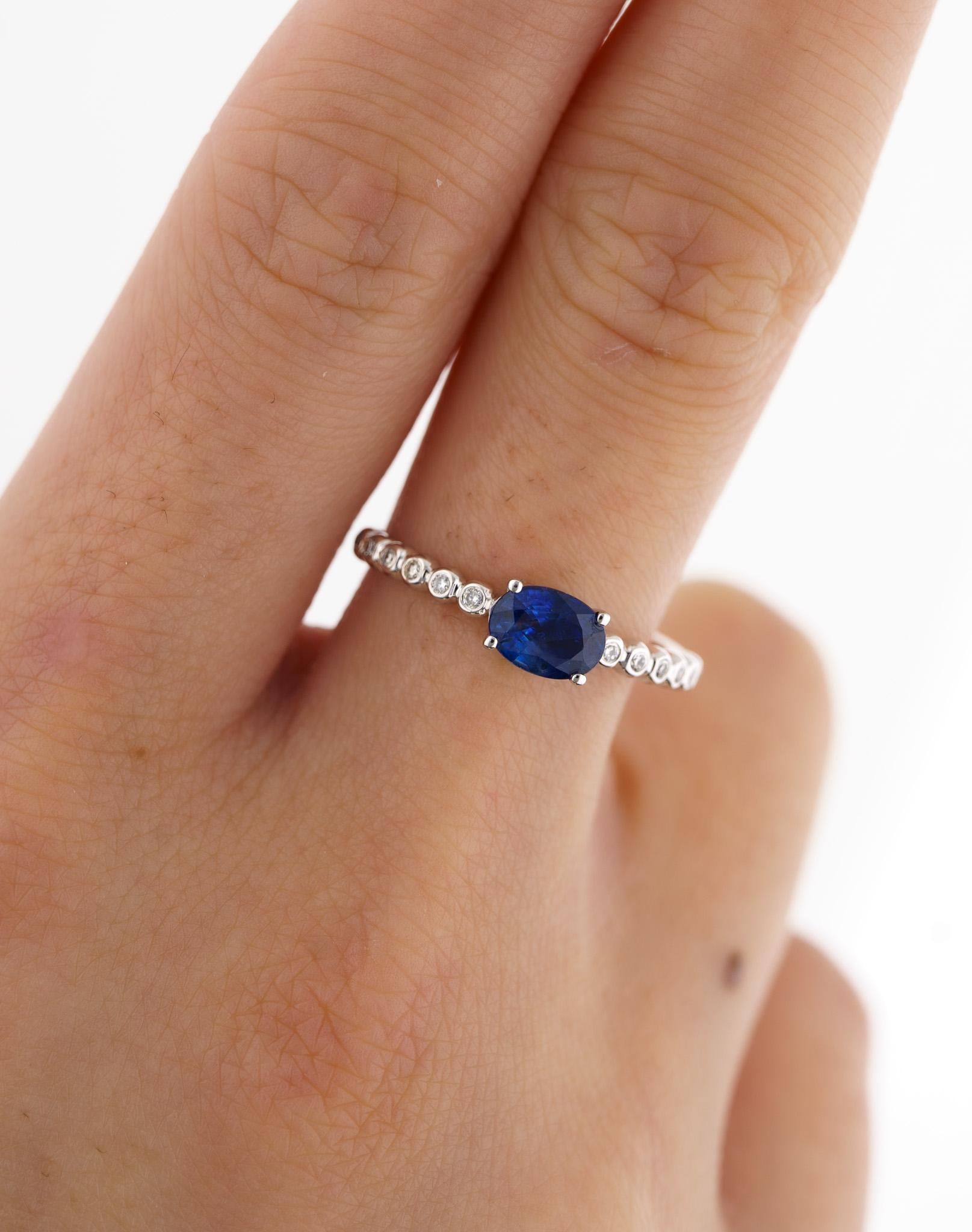 Modern 18K White Gold Oval Cut Natural Blue Sapphire & Bezel Diamond East West Ring  For Sale