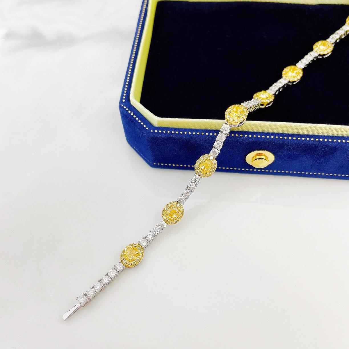18K White Gold Oval-Cut Yellow Diamond Bracelet with Diamonds

Yellow Diamonds - 1.35 CT
Diamonds - 1.90 CT

Total Weight - 7.15 GM