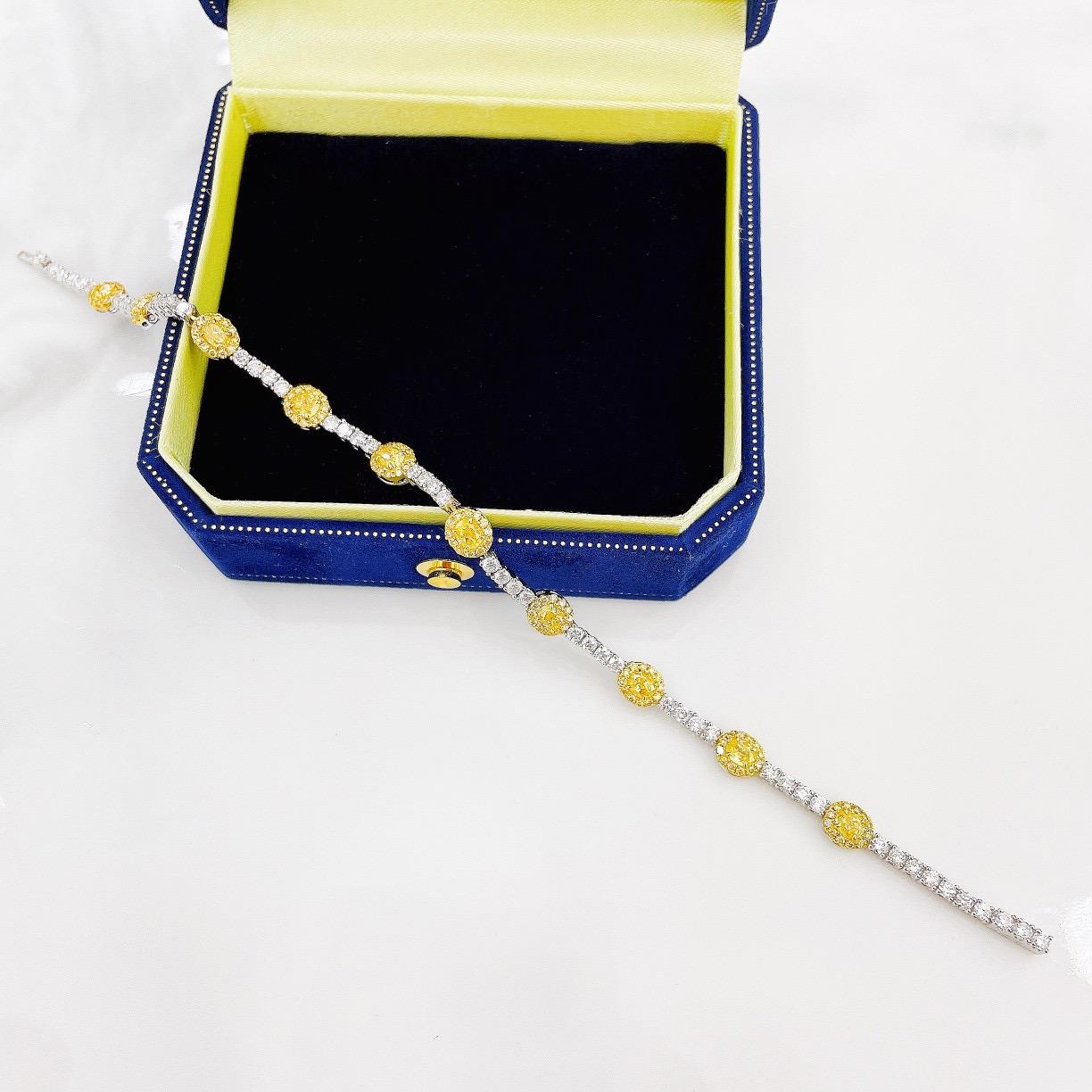 Modern 18K White Gold Oval-Cut Yellow Diamond Bracelet with Diamonds For Sale