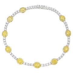 Bracelet en or blanc 18 carats avec diamants jaunes de taille ovale