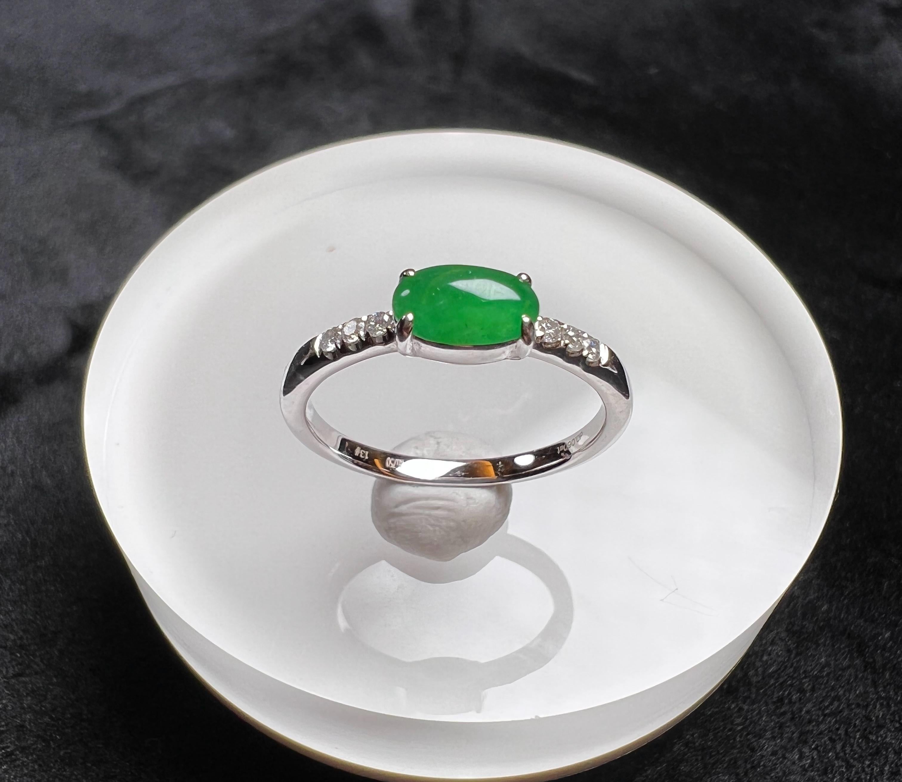 18K White Gold Oval Green Jadeite Diamond Ring, Engagement Ring

Size: M 1/2 (UK) / 6.5 (US)
Circumference (approx.): 53mm
Diameter (approx.): 16.9mm

Total weight (approx.): 2.4g
Main stone (jadeite) measurement (approx.): 7*4.1mm
Side stone