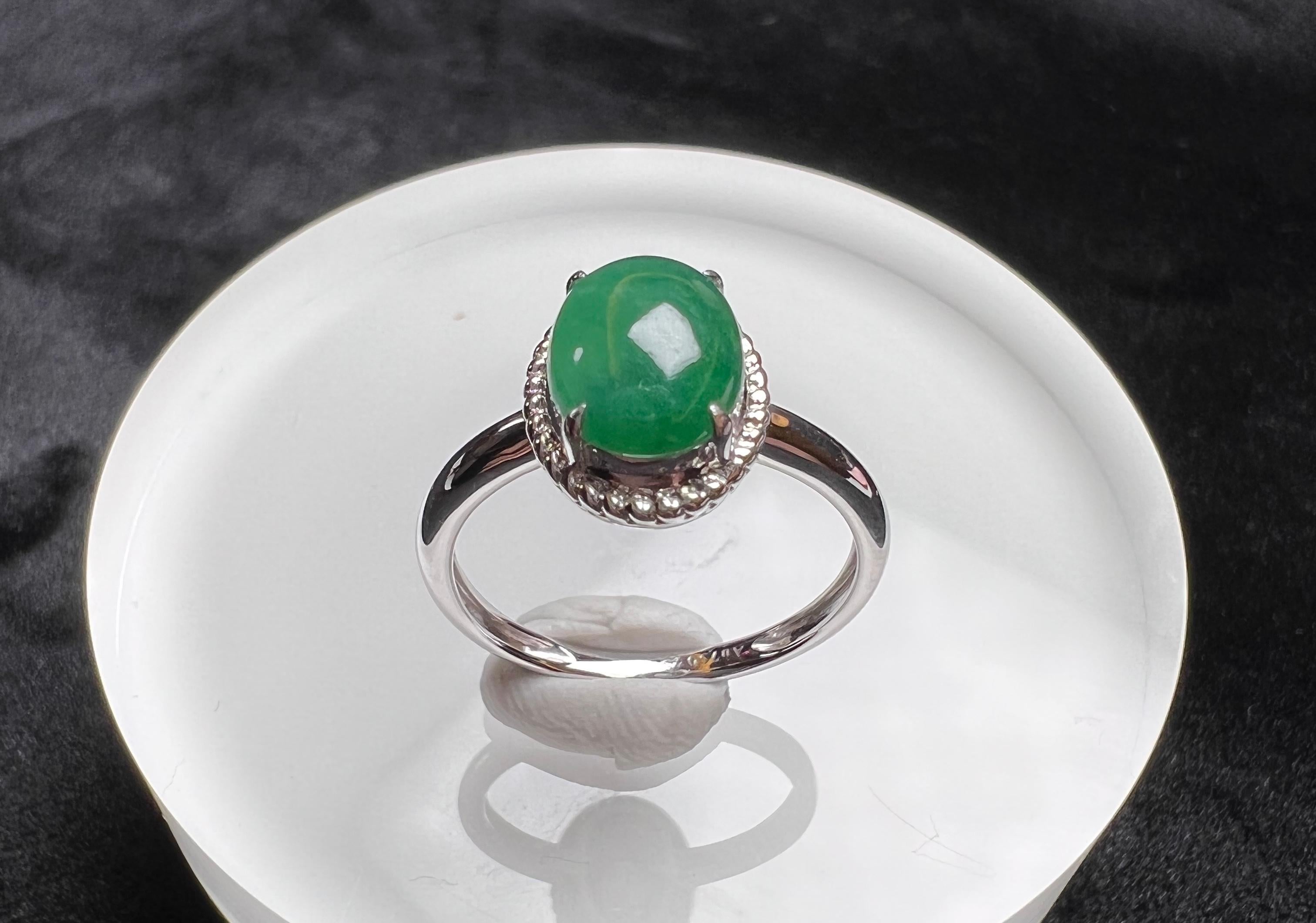 18K White Gold Oval Green Jadeite Ring, Engagement Ring

Total weight (approx.): 2.5g
Centre stone measurement (approx.): 8.8*7mm

This ring is resizable.
Get in touch with us to know more details and your shipping options.

The 18K White Gold Oval