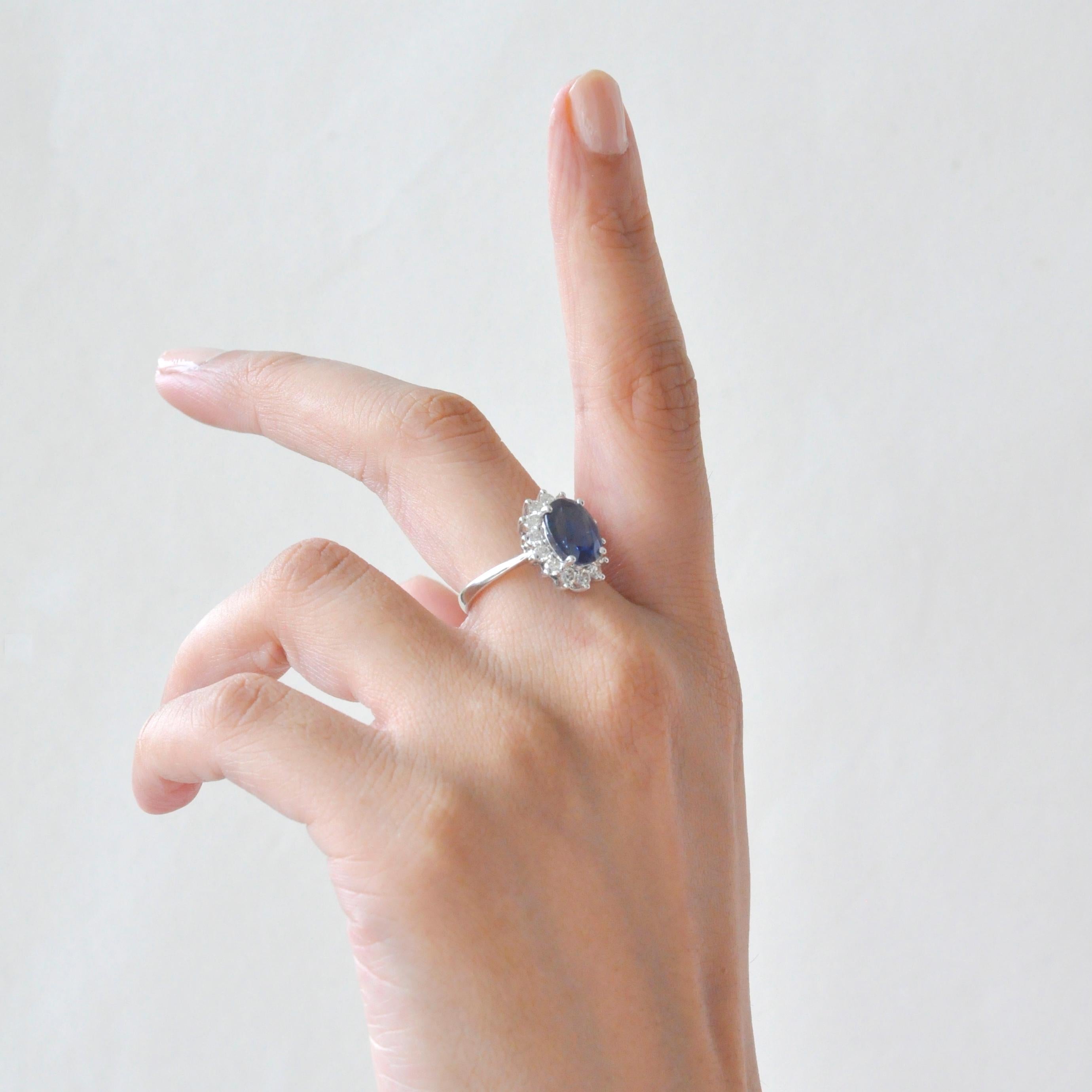 Modern 18 Karat White Gold Certified Oval Blue Sapphire Diamond Engagement Ring For Sale