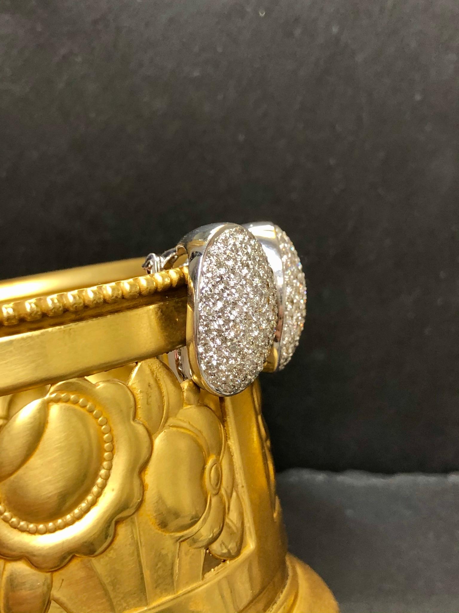 Round Cut 18k White Gold Oval Pave Diamond Omega Back Diamond Huggie Earrings H Vs 5cttw For Sale