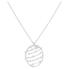 18K White Gold Oval Pendant with Diamond Flower