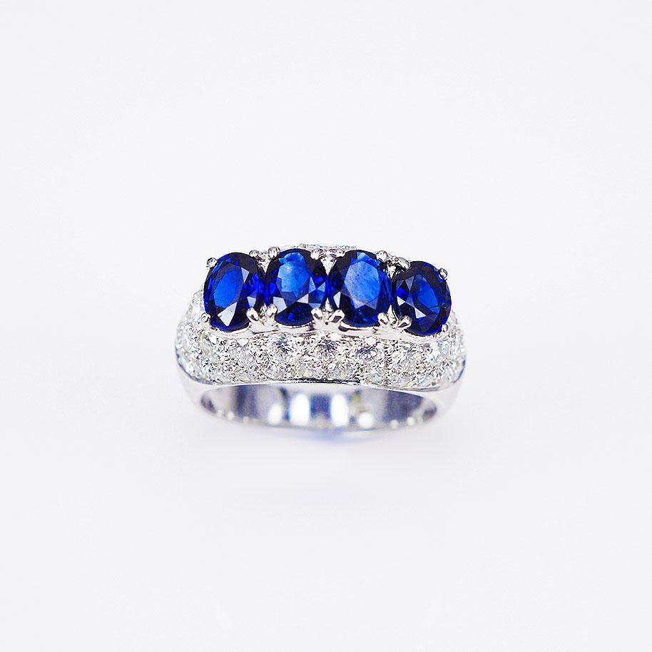 Oval sapphire and diamond ring made in 18k White gold .It use deep blue color sapphire.
Oval sapphire 2.76 ct High quality sapphire
Diamond 1.84 ct  G VS quality
This ring size is 7 US size.
We can adjust as your size.
