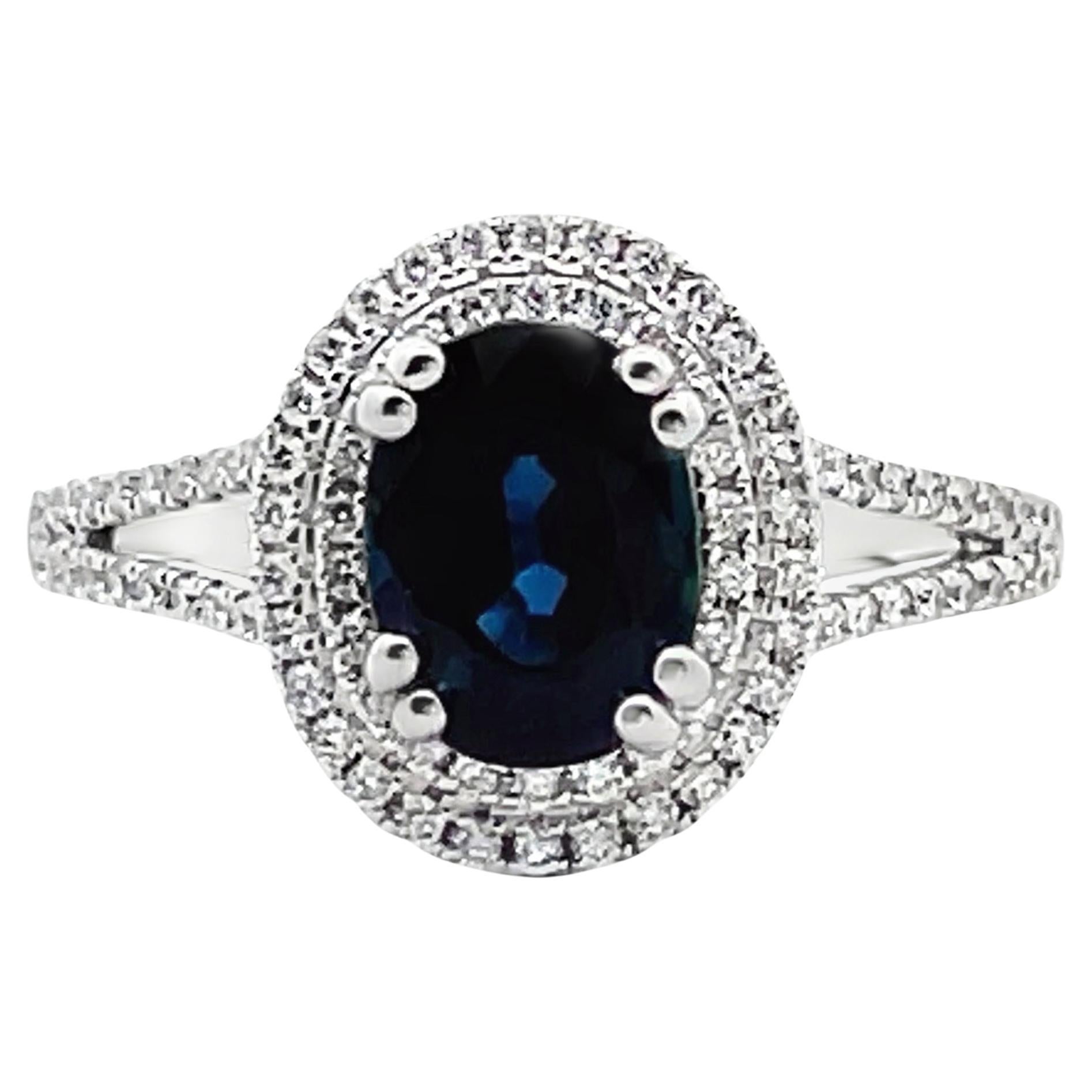18K White Gold Oval Sapphire Ring with Double Halo Round Diamonds Split Shank For Sale