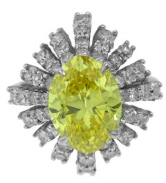 18K White Gold Oval Yellow Diamond and Round Diamond Ring – IGL Certified
