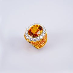 18 Carat White Gold Oval Yellow Sapphire and Diamond Ring