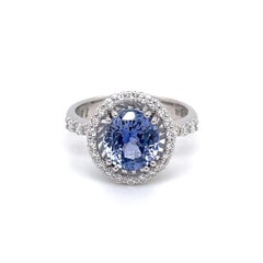 18k White Gold Pastel Blue Sapphire Ring with a White Diamond Halo