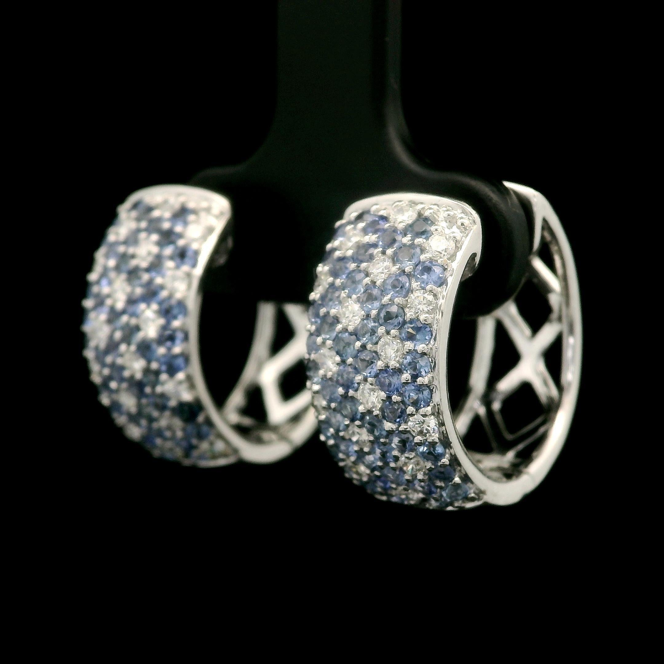 --Stone(s):--
(Numerous) Natural Genuine Diamonds - Round Brilliant Cut - Pave Set - Nice Brilliant White Color- 0.30ctw (approx.)
(Numerous) Natural Genuine Sapphires - Round Brilliant Cut - Pave Set - Soft Blue Color - 1.25ctw (approx.)

Material: