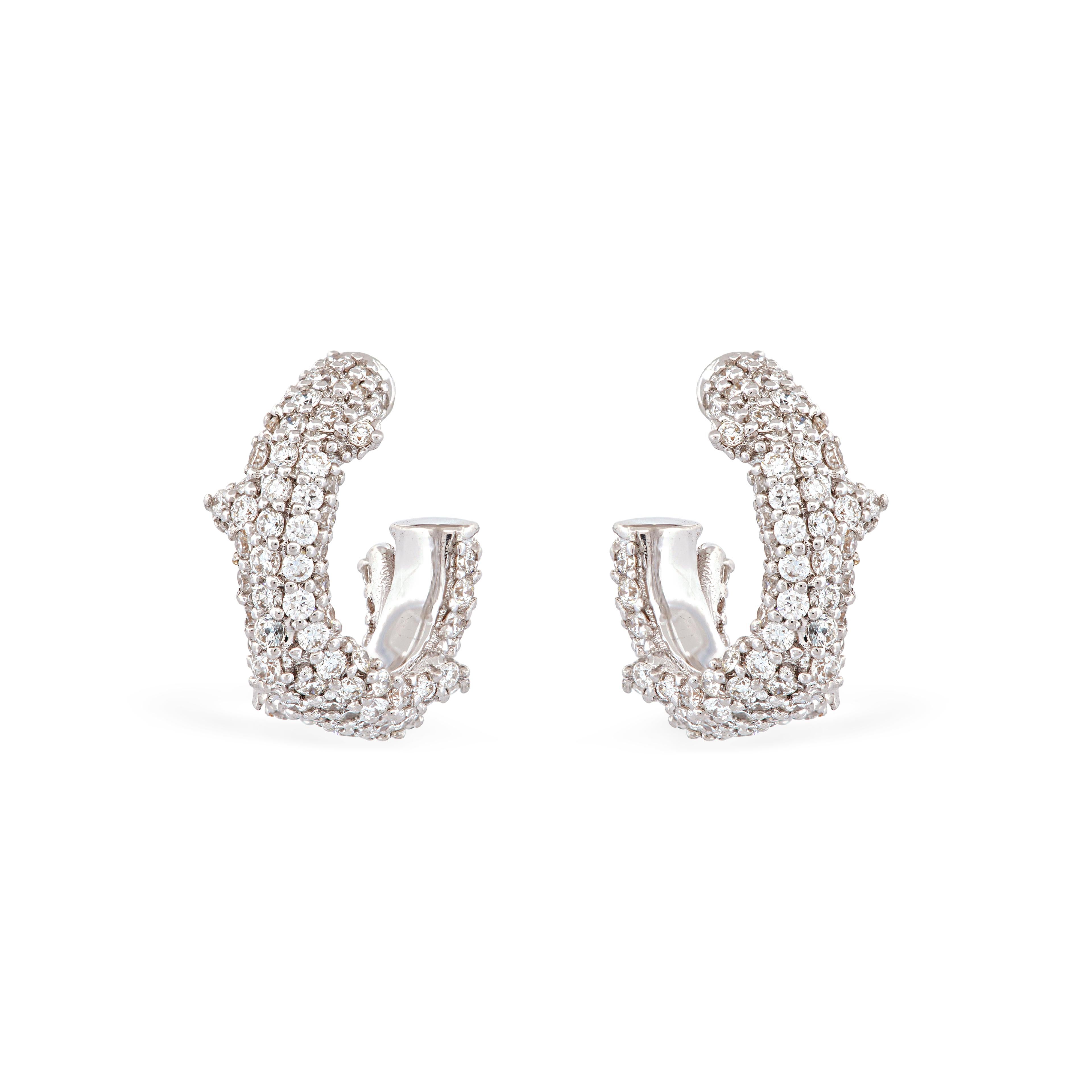 Our Pave Flora Spina Nano Earrings feature 192 VS-quality white diamonds, totaling 0.64 ttcw for the pair. 

Available as single or pair.